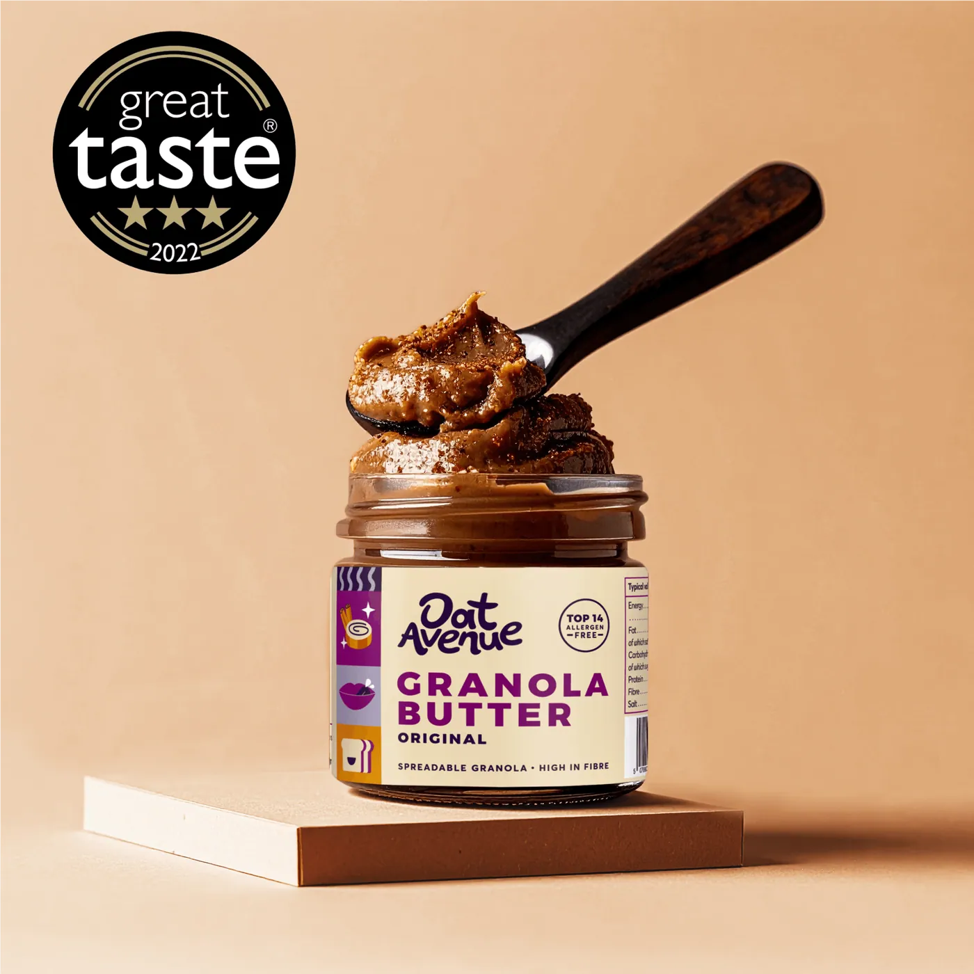Chocolate granola butter jar with a spoon and a Great Taste award badge