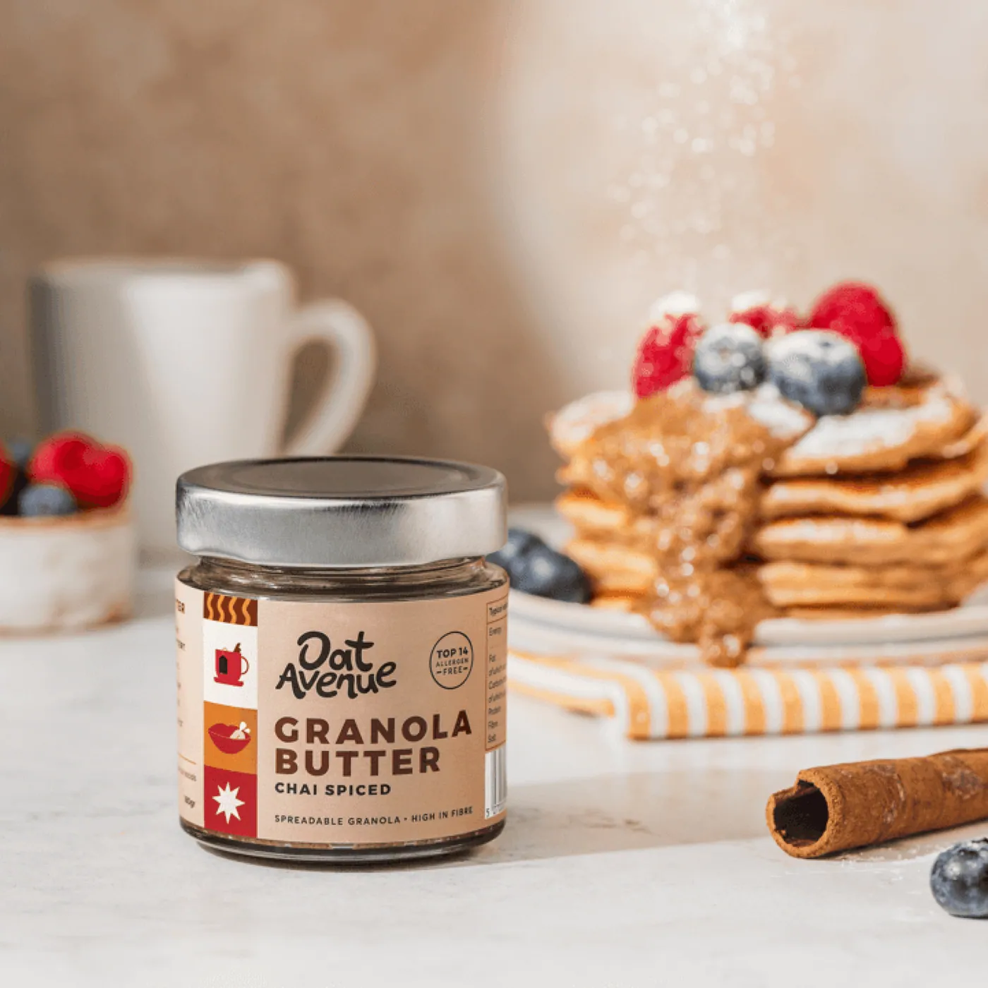 Pancakes topped with Chai Spiced granola butter and berries